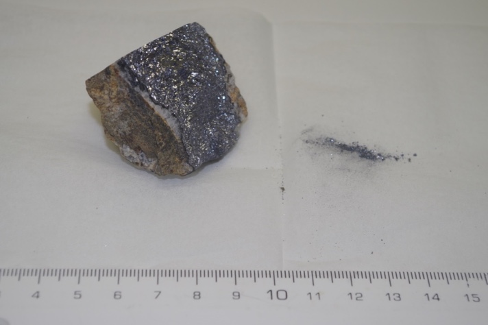 a hand specimen of galena ore (metallic grey